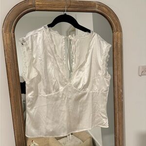 White blouse with lace trimming